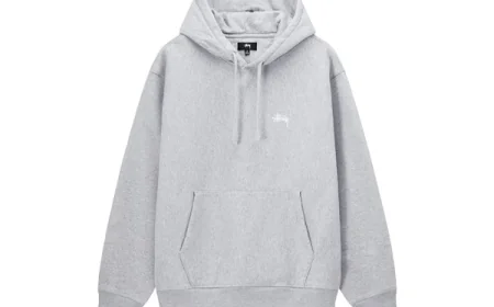 Street Style in Soft Shades: The Power of the Black Stussy Hoodie