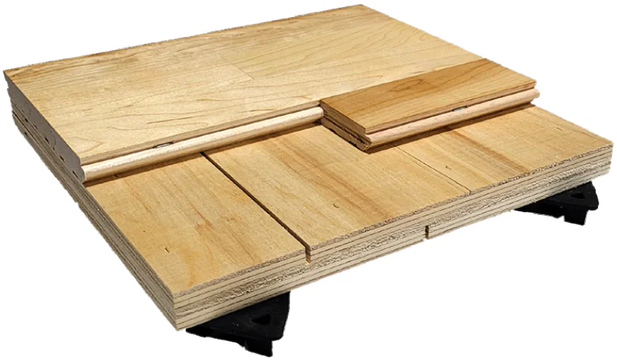 What are the key features that define high-quality maple sports flooring systems?