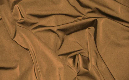 How Does Satin Fabric Enhance Color Depth in Table Linens and Draping