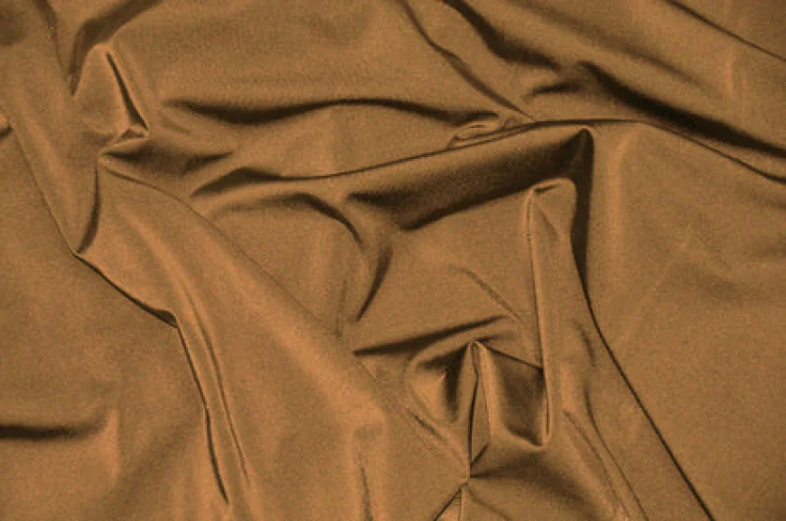 How Does Satin Fabric Enhance Color Depth in Table Linens and Draping