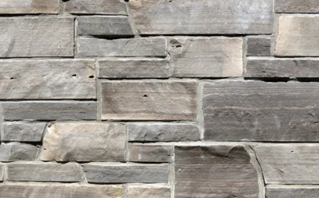 Create a cozy living space with natural stone features