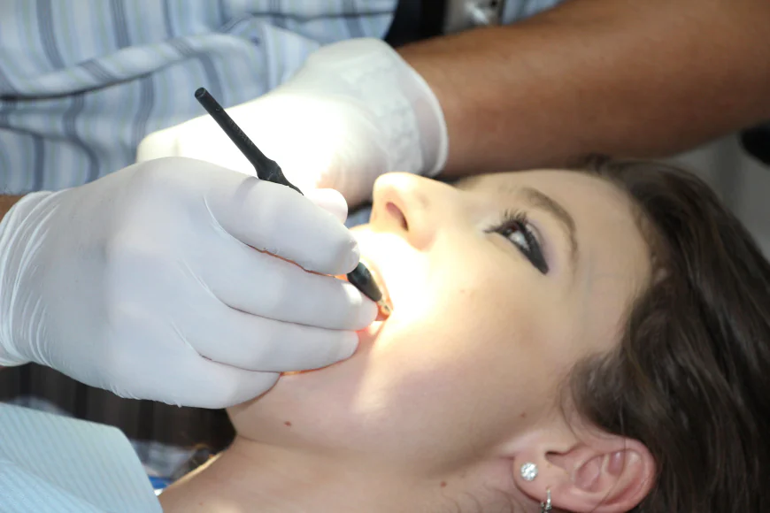 Transform Your Smile with Dental Implants and Composite Bonding at Iconic Smiles