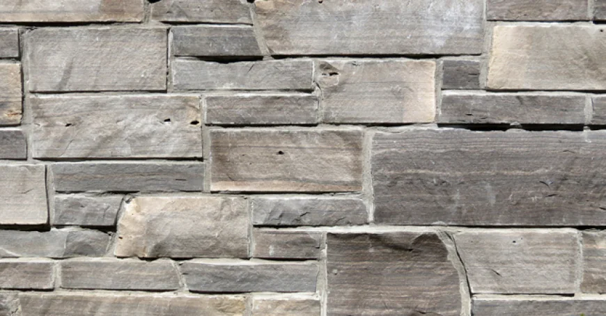 Create a cozy living space with natural stone features
