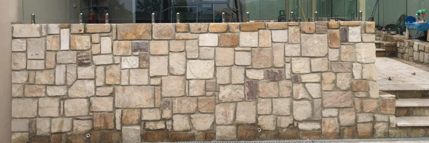 Sandstone Log Walls in Canberra: A Natural Choice for Beautiful and Durable Landscaping