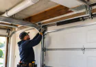 How Low Ceilings and Obstructed Headers Change the Track System Needed for a New Garage Door